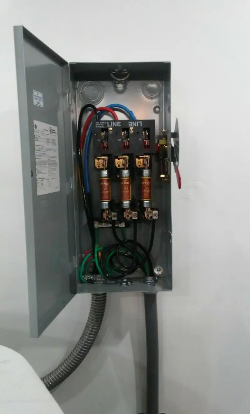 Three-phase disconnect switch installed for Smoke Detector Installation in Charlotte